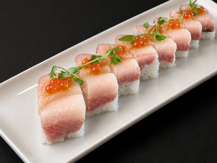 Pressed hamachi sushi with ikura, yuzu and truffle soy
