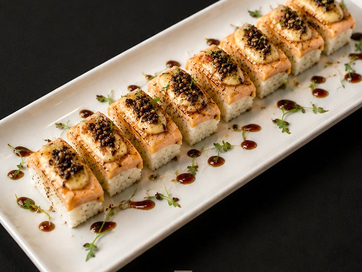 Pressed torched salmon sushi with black garlic aioli
